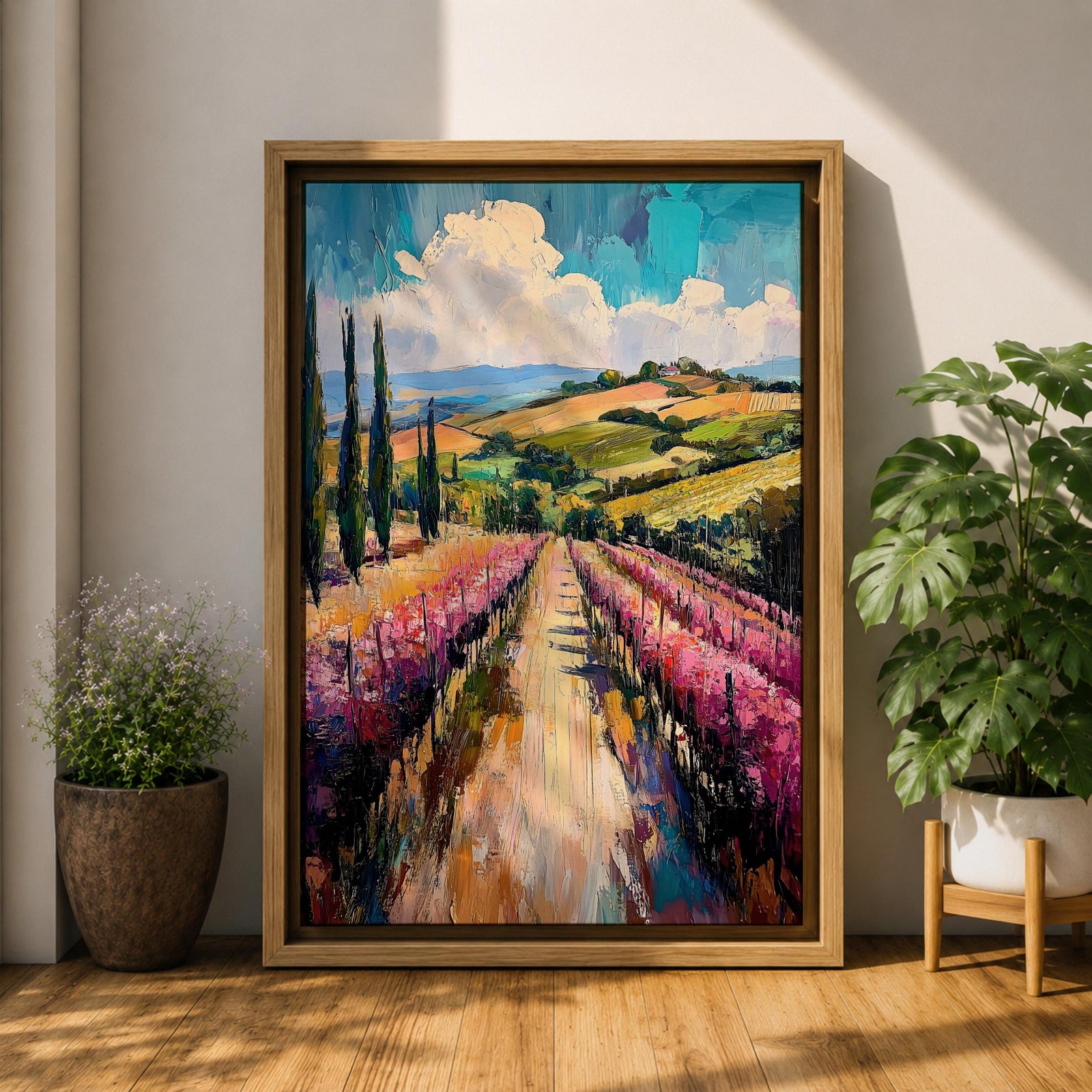 This impasto style oil painting depicts a vineyard landscape with rows of grapevines stretching into the distance under a partly cloudy sky. The textured brushstrokes create depth and vibrancy, highlighting the rolling hills and tall cypress trees characteristic of a country vineyard scene.