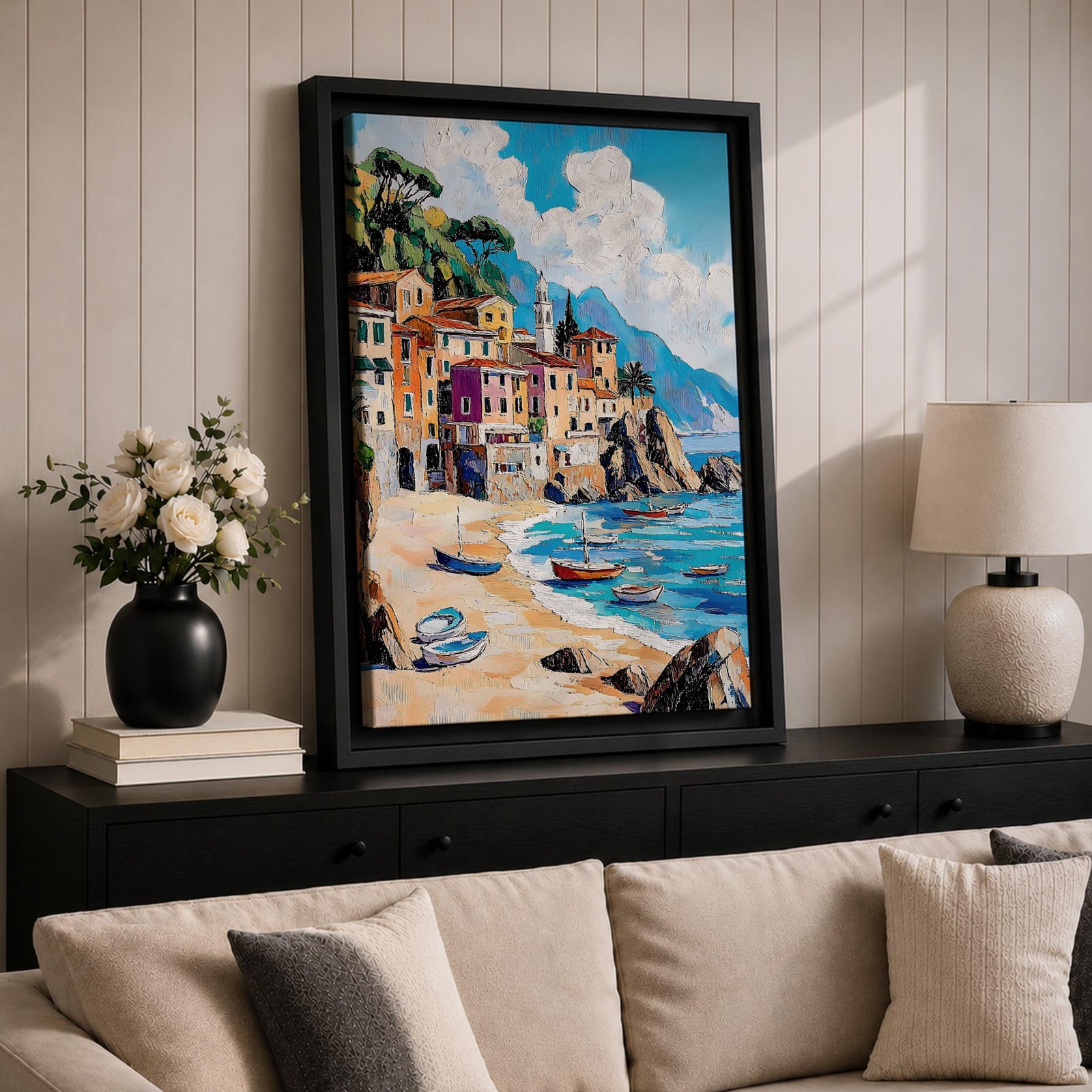 A vibrant Mediterranean seascape painting depicting colorful coastal buildings along a sandy beach with small boats floating on turquoise waters under a bright blue sky with fluffy clouds, rendered in a lively, textured style capturing the essence of a sunny seaside village.