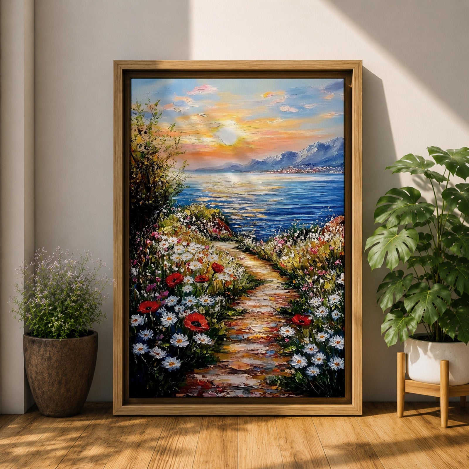 An impasto style framed canvas painting depicting a coastal sunset path bordered by vibrant wildflowers leading to a calm sea with distant mountains under a colorful sky. The textured brush strokes emphasize the natural landscape and seaside atmosphere.