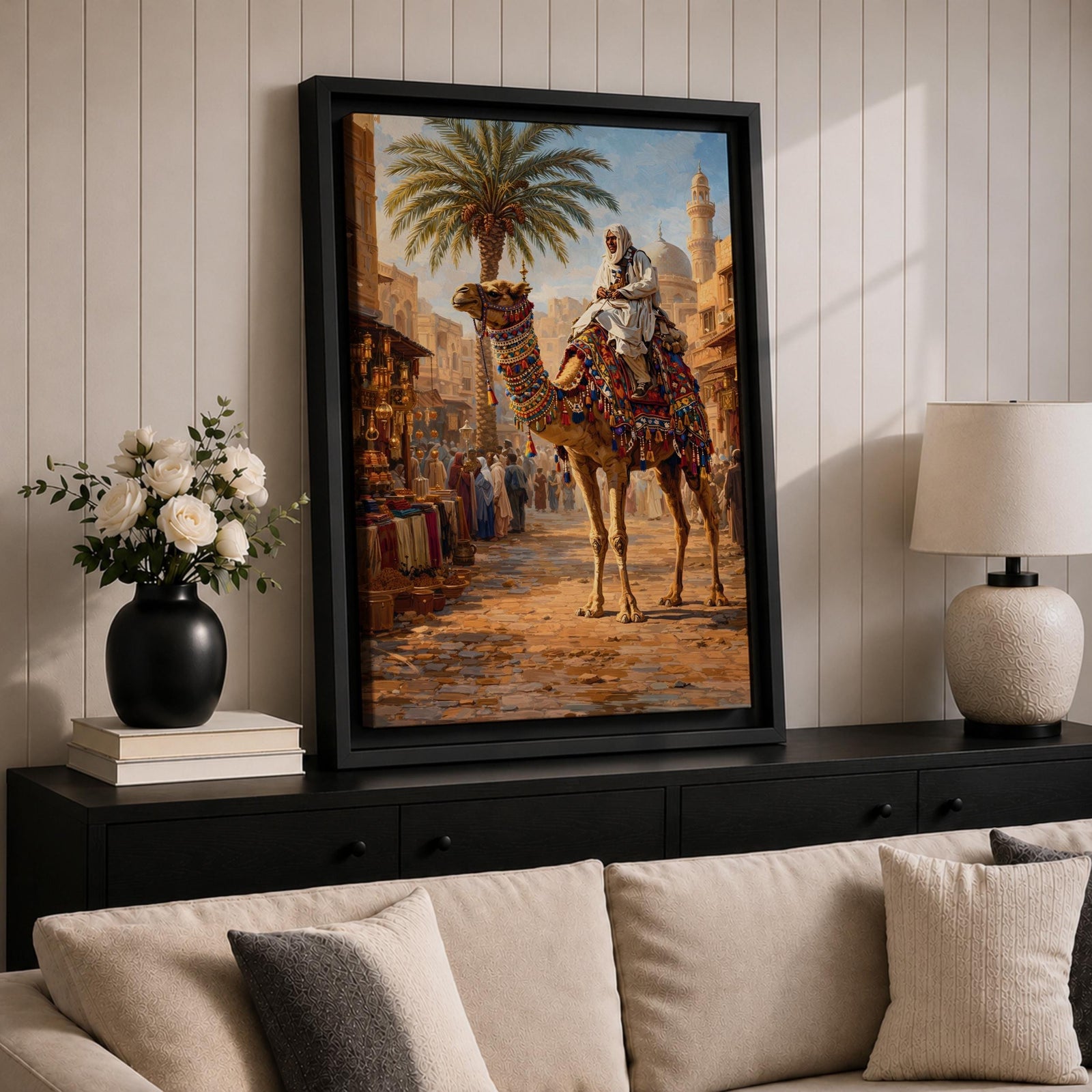A detailed painting of a Bedouin camel rider dressed in traditional white robes atop a camel adorned with colorful textiles, set in a bustling Middle Eastern market street with palm trees and historic buildings under a bright sky, capturing cultural life in a realistic style.
