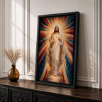 A mosaic-style framed canvas depicting the Sacred Heart of Jesus with radiant beams of light emanating from the heart. The figure is dressed in flowing robes with one hand raised in blessing and the other pointing to the glowing heart, set against a vibrant, colorful mosaic background.