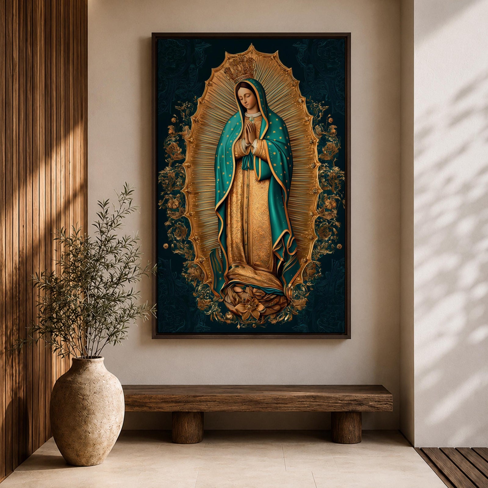 A detailed framed canvas artwork depicting Our Lady of Guadalupe standing with hands clasped in prayer, surrounded by a radiant golden aura and floral motifs, rendered in a traditional style emphasizing intricate patterns and symbolic elements.