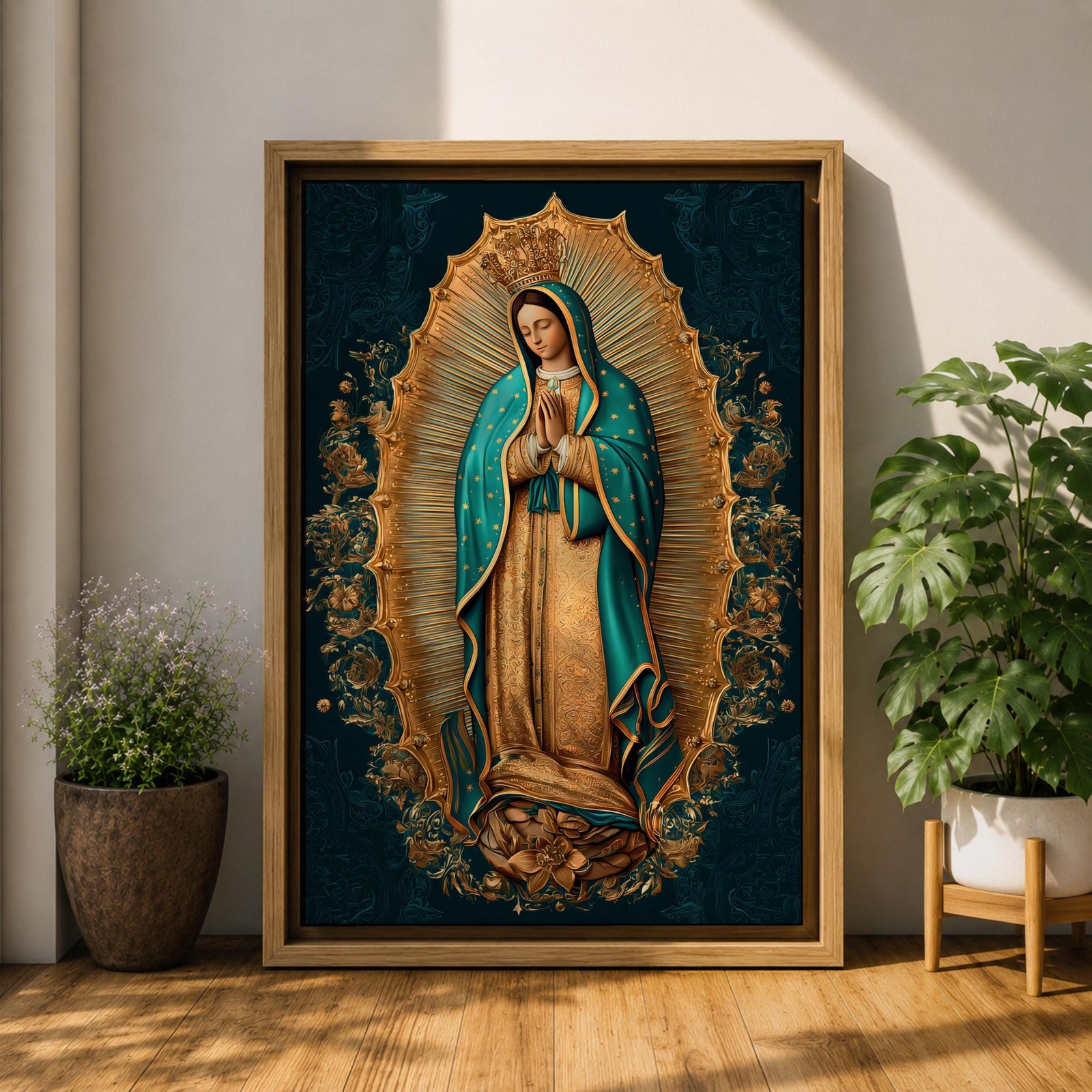 A detailed framed canvas artwork depicting Our Lady of Guadalupe standing with hands clasped in prayer, surrounded by a radiant golden aura and floral motifs, rendered in a traditional style emphasizing intricate patterns and symbolic elements.