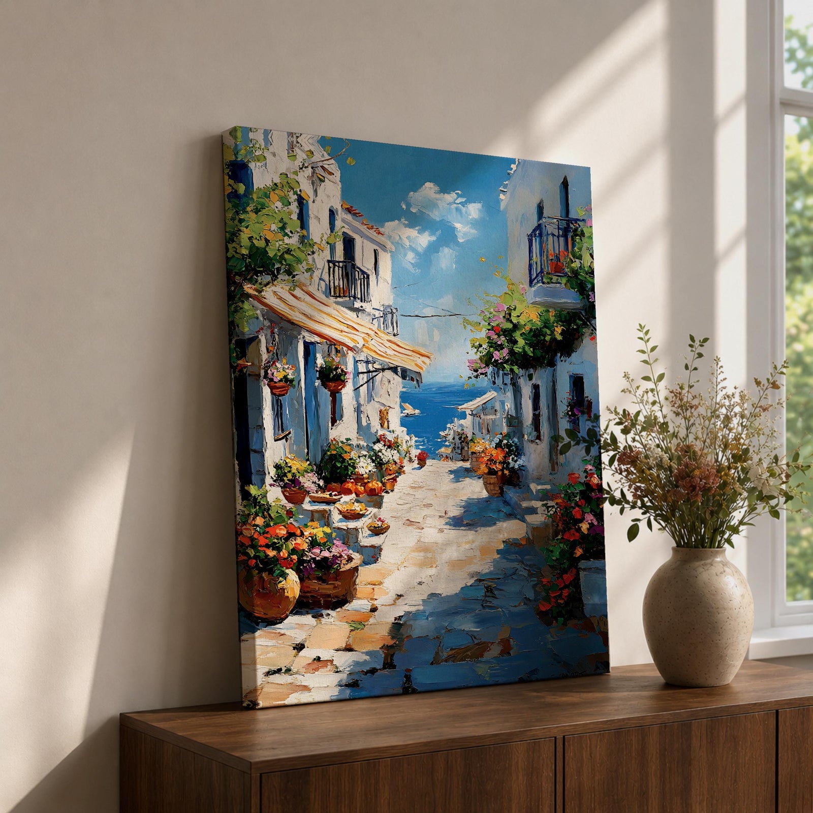 An impasto style painting depicting a charming Greek island village street with whitewashed buildings, colorful flowers in pots, balconies, and a view of the blue sea under a partly cloudy sky. The textured brushstrokes create a vivid Mediterranean coastal atmosphere.