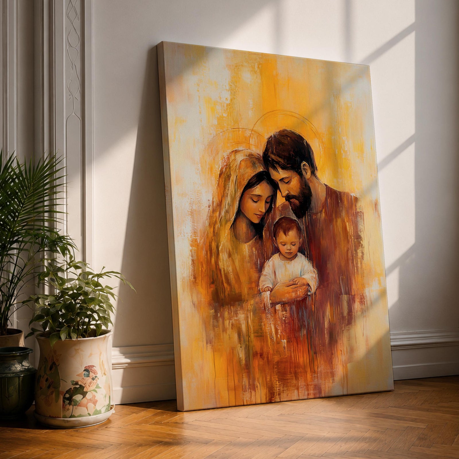 An oil painting depicting the Holy Family with Mary, Joseph, and baby Jesus in a tender pose. The artwork features warm tones and soft brushstrokes, emphasizing the intimate connection between the figures. The composition highlights the Nativity scene with a classic religious style.