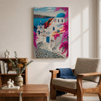 A vibrant framed canvas depicting Santorini, Greece, featuring iconic white buildings with blue domes, winding cobblestone paths, and bright bougainvillea flowers overlooking a deep blue sea, rendered in a clean, graphic style emphasizing architectural shapes and Mediterranean coastal charm.