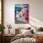 A vibrant framed canvas depicting Santorini, Greece, featuring iconic white buildings with blue domes, winding cobblestone paths, and bright bougainvillea flowers overlooking a deep blue sea, rendered in a clean, graphic style emphasizing architectural shapes and Mediterranean coastal charm.