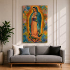 A vibrant framed canvas depicting Our Lady of Guadalupe, showing the Virgin Mary with hands clasped in prayer, wearing a blue mantle adorned with stars and a pink dress, surrounded by radiant golden rays and a colorful abstract background.