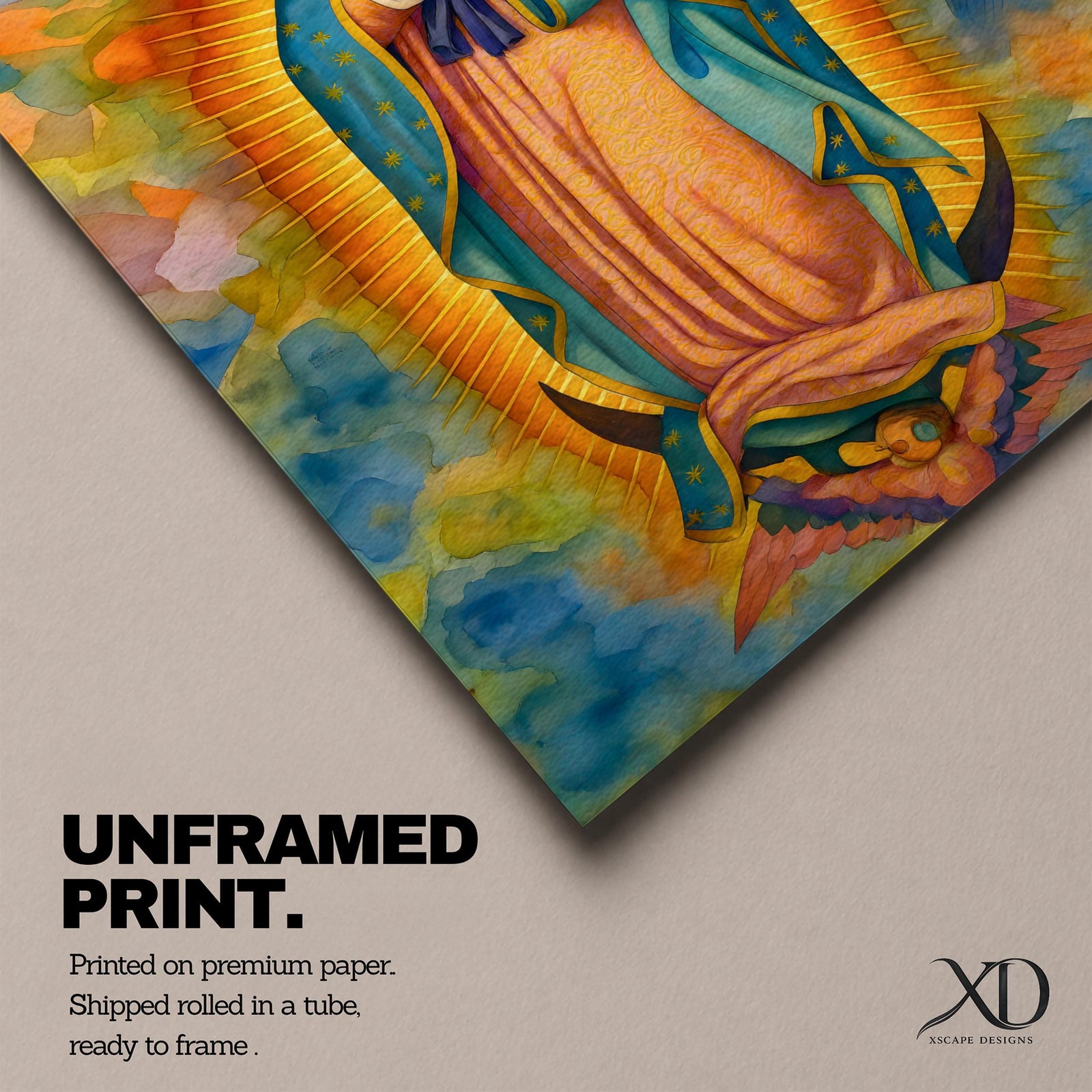 A vibrant framed canvas depicting Our Lady of Guadalupe, showing the Virgin Mary with hands clasped in prayer, wearing a blue mantle adorned with stars and a pink dress, surrounded by radiant golden rays and a colorful abstract background.