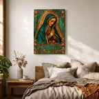A vintage-style framed canvas depicting Our Lady of Guadalupe with her hands clasped in prayer, wearing a teal mantle adorned with stars and a golden halo radiating behind her. The artwork features intricate floral patterns surrounding the figure, emphasizing traditional Mexican Catholic iconography.