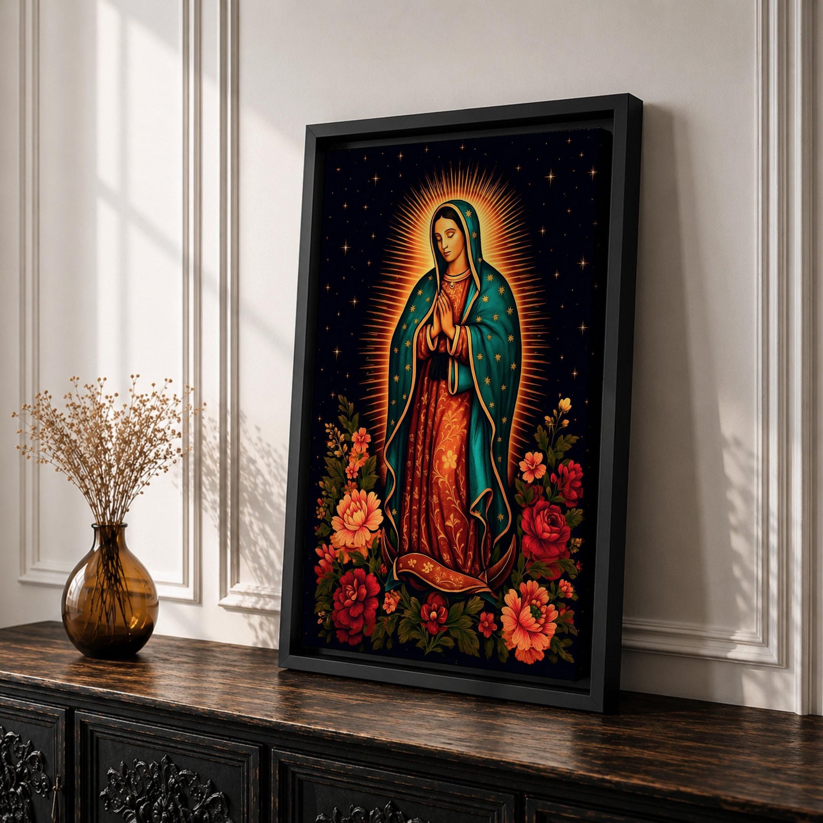 A detailed framed canvas wall art depicting Our Lady of Guadalupe standing with hands clasped in prayer, surrounded by radiant golden rays and vibrant floral arrangements, rendered in a classic Catholic style with rich symbolic elements and a dark starry background.