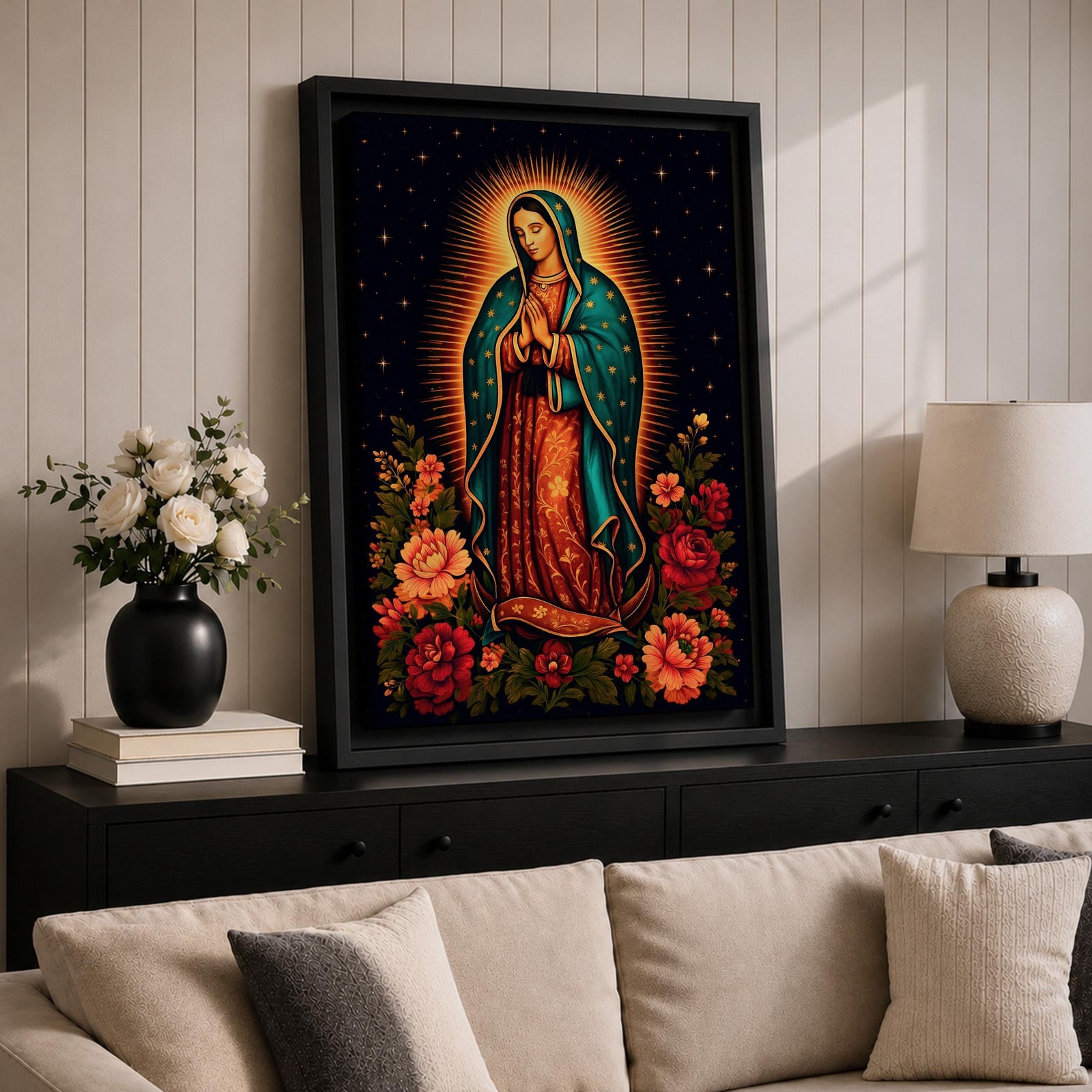 A detailed framed canvas wall art depicting Our Lady of Guadalupe standing with hands clasped in prayer, surrounded by radiant golden rays and vibrant floral arrangements, rendered in a classic Catholic style with rich symbolic elements and a dark starry background.