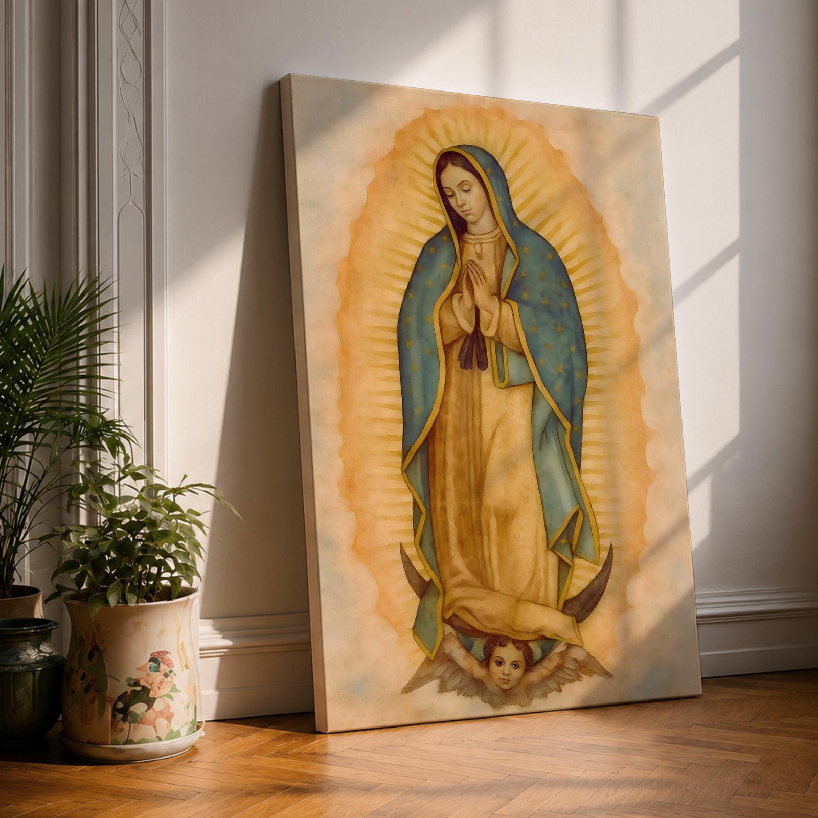 A framed vintage-style depiction of Our Lady of Guadalupe showing the Virgin Mary with hands clasped in prayer, surrounded by a glowing aura and standing on a crescent moon held by an angelic cherub, rendered with soft, aged textures and warm tones.