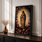 A detailed framed canvas depicting Our Lady of Guadalupe, also known as Virgin of Guadalupe, surrounded by floral motifs. The artwork features a traditional religious figure with a radiant halo and a floral border, rendered in a classic style suitable for Catholic-themed decor.