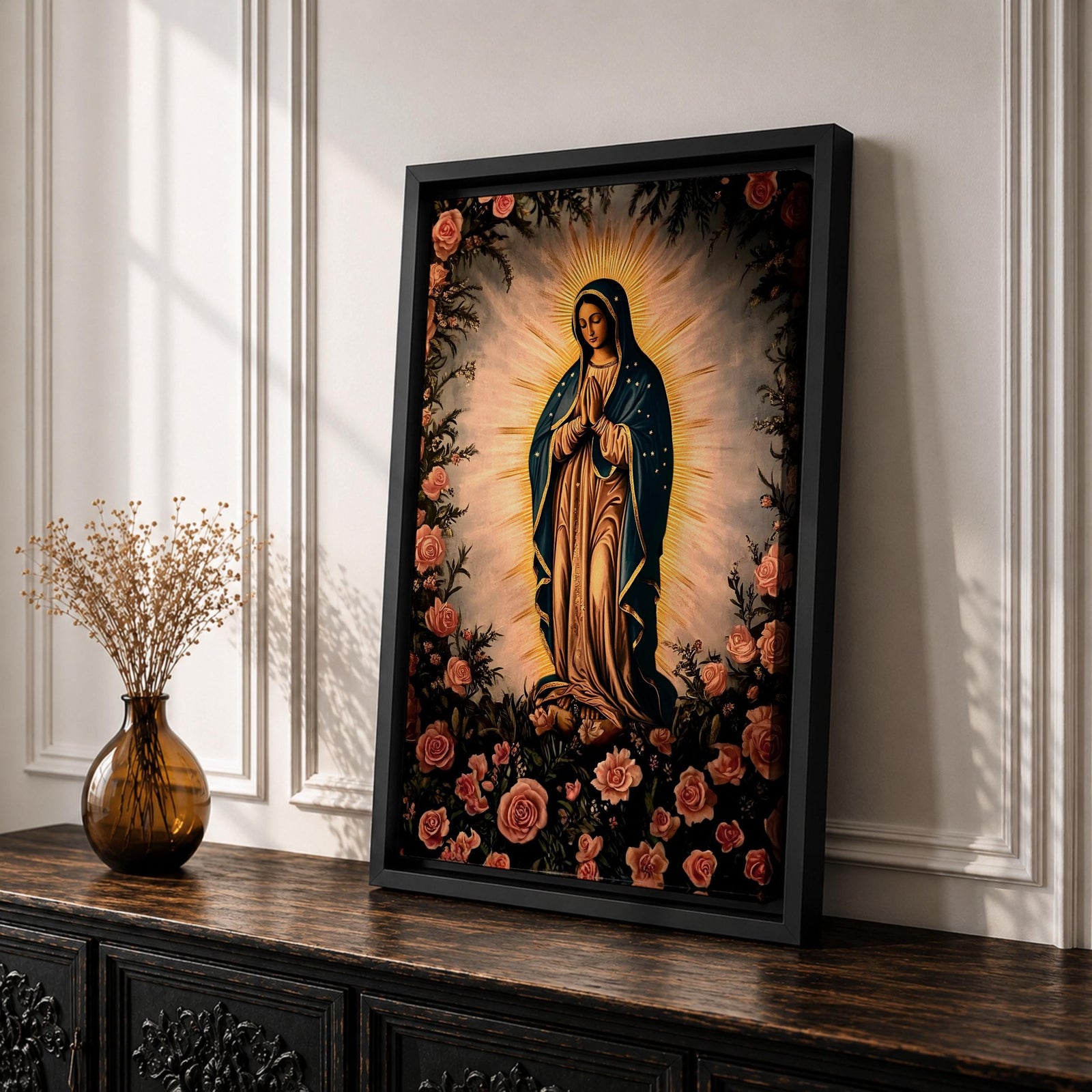 A detailed framed canvas depicting Our Lady of Guadalupe, also known as Virgin of Guadalupe, surrounded by floral motifs. The artwork features a traditional religious figure with a radiant halo and a floral border, rendered in a classic style suitable for Catholic-themed decor.