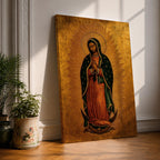 A traditional devotional depiction of Our Lady of Guadalupe standing with hands folded in prayer, wearing a rose colored gown and a teal mantle covered in gold stars, surrounded by radiant golden sun rays and standing above a crescent moon supported by an angel, rendered in classic Mexican Catholic icon style with rich colors and sacred symbolism.