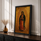 A traditional devotional depiction of Our Lady of Guadalupe standing with hands folded in prayer, wearing a rose colored gown and a teal mantle covered in gold stars, surrounded by radiant golden sun rays and standing above a crescent moon supported by an angel, rendered in classic Mexican Catholic icon style with rich colors and sacred symbolism.