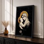 A framed canvas artwork depicting Madonna and Child with golden halos against a starry black background. The image shows the Virgin Mary tenderly holding the infant Jesus, rendered in a classical style with detailed shading and a serene expression, emphasizing their close bond.