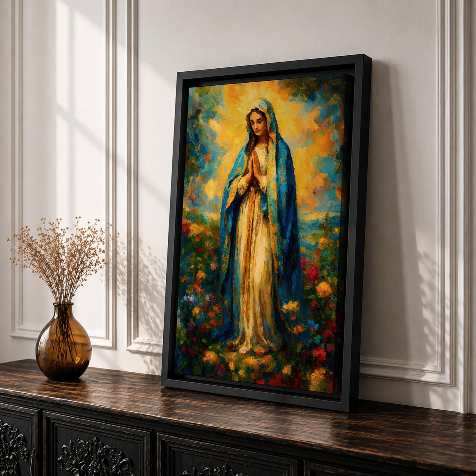 An impressionist style painting of the Virgin Mary standing with hands clasped in prayer, draped in a blue cloak and surrounded by colorful floral elements. The artwork captures a soft, textured brushstroke technique emphasizing spiritual reverence and vibrant natural surroundings.