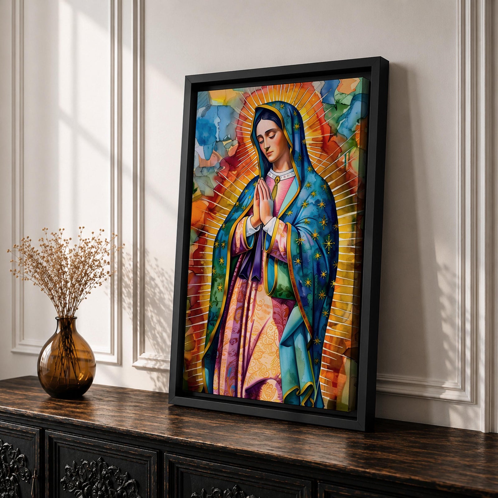A vibrant stained glass style portrait of Our Lady of Guadalupe featuring her traditional blue mantle with stars and hands clasped in prayer, surrounded by radiant golden rays and colorful abstract background elements, capturing the iconic Mexican Marian apparition in a modern decorative format.