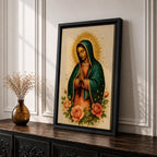 Traditional devotional illustration of Our Lady of Guadalupe standing with hands clasped in prayer, wearing a rose colored gown and a teal mantle covered with gold stars, surrounded by radiant golden rays and supported by a small angel beneath her, rendered in warm antique tones with delicate shading in a classic Mexican Catholic icon style.