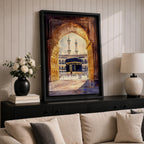 Watercolor-style artwork of the Kaaba at Masjid Al Haram in Mecca viewed through a grand mosque archway with open golden doors and pilgrims gathered in the courtyard beneath tall minarets.