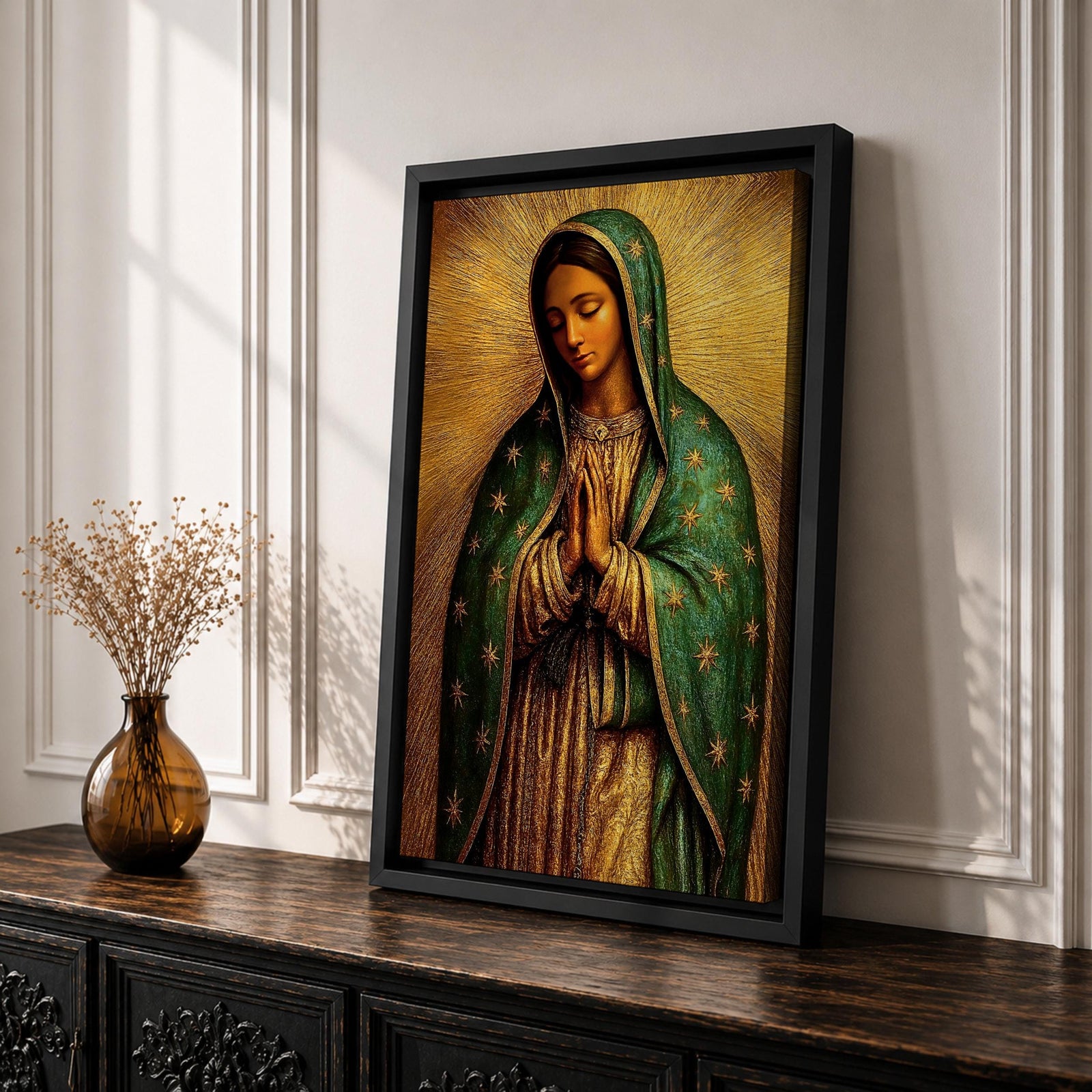 Illustration of the Virgin of Guadalupe also known as La Morenita standing with hands clasped in prayer, wearing a rose colored gown and a teal mantle covered with gold stars, surrounded by radiant golden rays with a small angel beneath her, rendered with warm tones and textured shading in a rustic devotional style inspired by Mexican Catholic iconography.