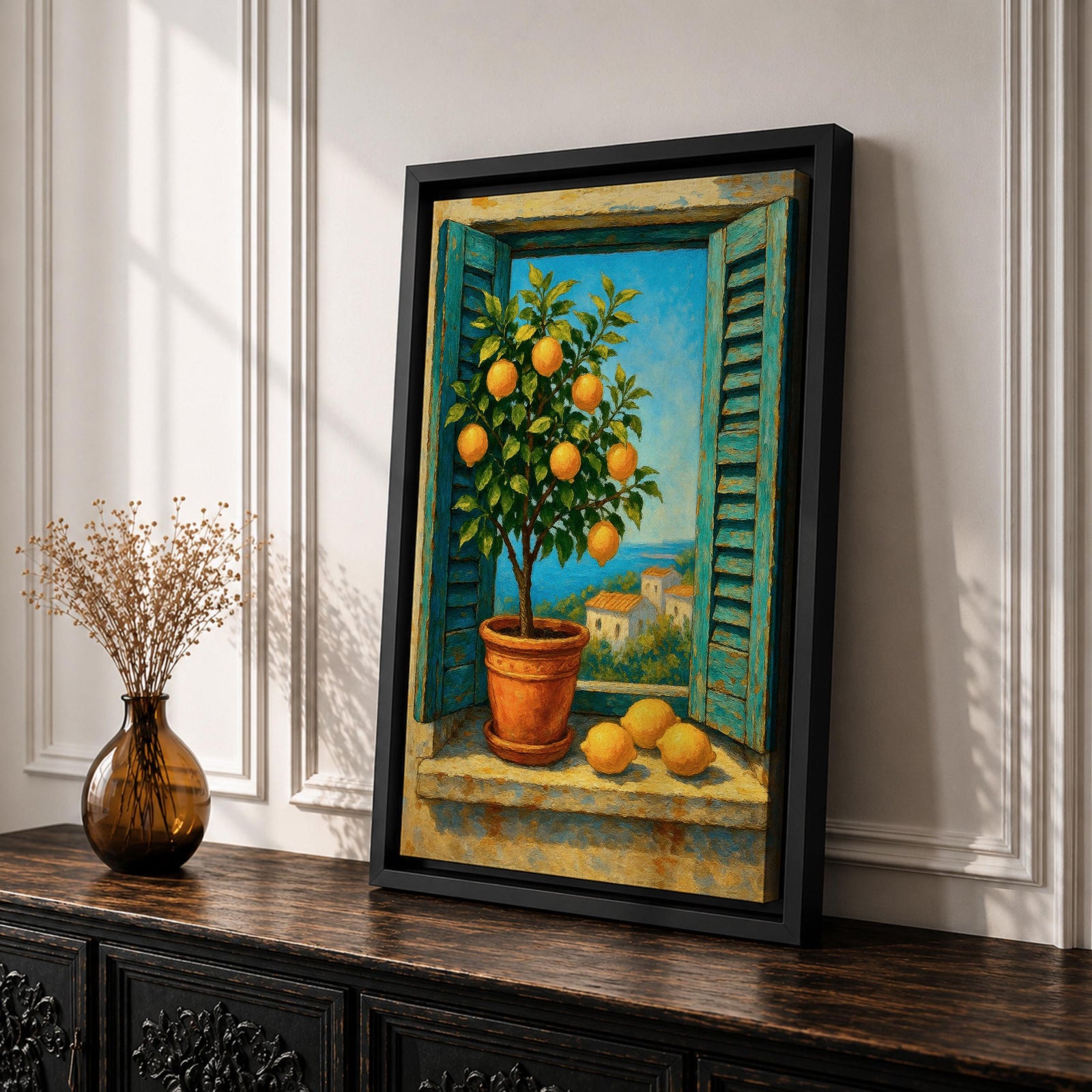 A vibrant framed canvas painting depicting a lemon tree in a terracotta pot set within an open window with blue shutters overlooking a Mediterranean coastal landscape. The artwork captures lush green leaves and ripe lemons with a rustic garden feel, emphasizing natural beauty and outdoor tranquility.