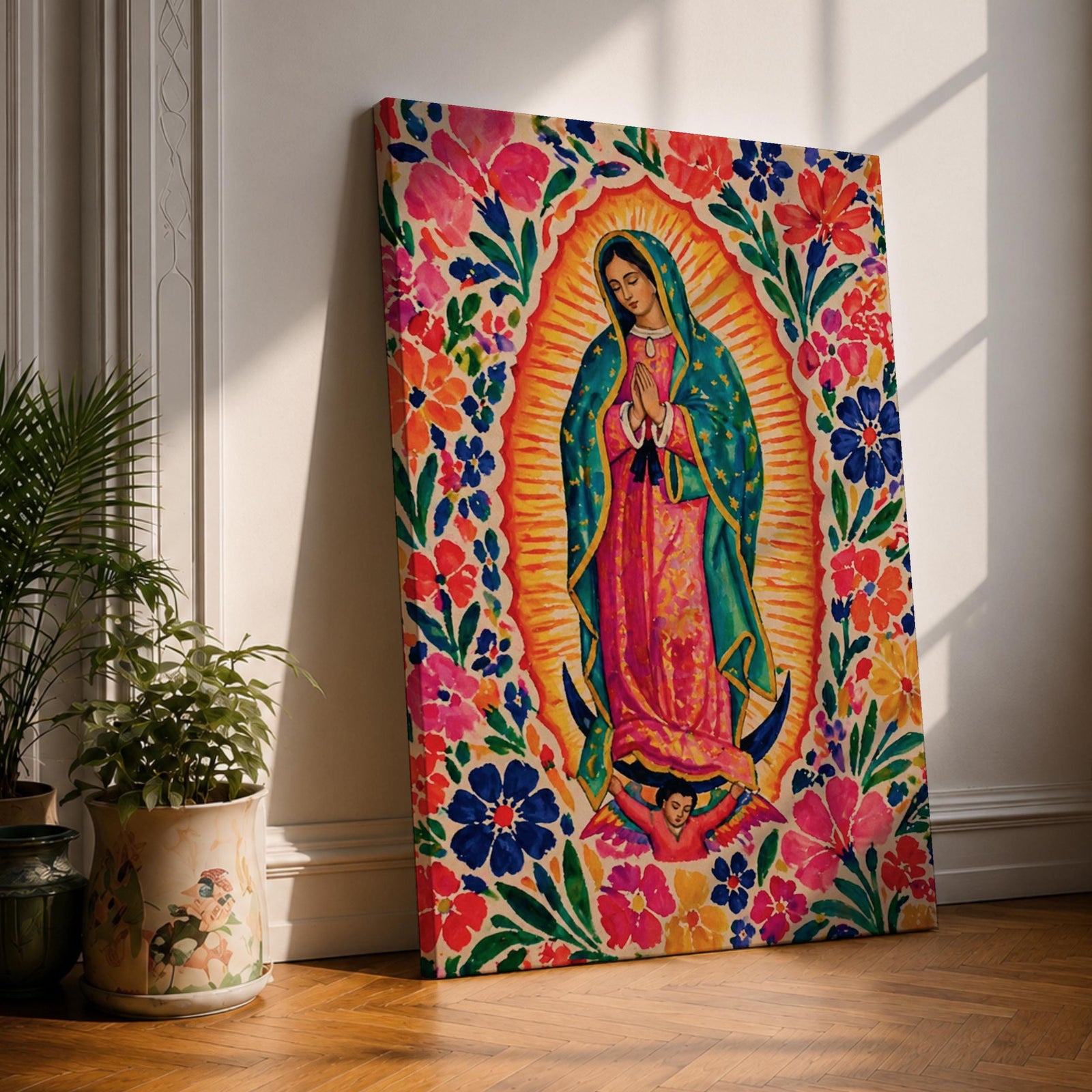 Our Lady of Guadalupe wall art featuring the Virgin Mary in prayer surrounded by vibrant floral folk art patterns and a radiant golden aura. Bright pink, blue, orange, and red blossoms frame this colorful Mexican Catholic artwork, creating a joyful devotional centerpiece for home décor.