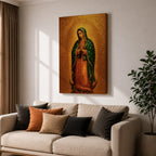 Devotional illustration of the Virgin of Guadalupe also known as the Mexican Virgencita standing with hands clasped in prayer, wearing a rose colored gown and a teal mantle covered with gold stars, surrounded by radiant golden rays with a small angel beneath her, rendered with warm tones and soft shading in a traditional Marian Catholic composition.