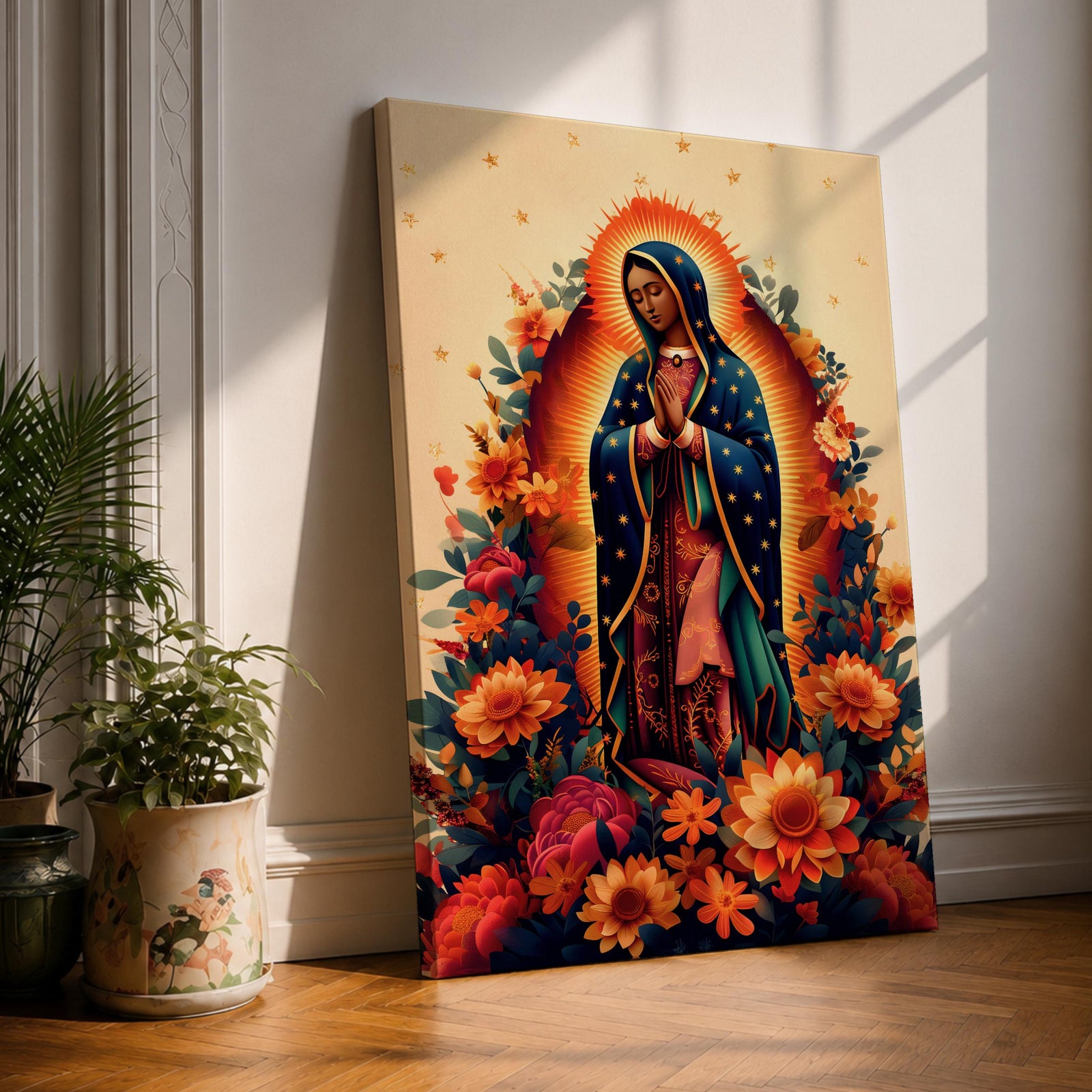 A devotional depiction of La Guadalupana as Our Lady of Guadalupe standing with hands clasped in prayer, wearing a rose pink gown and a teal mantle covered with gold stars, surrounded by radiant golden rays and standing above a crescent moon with an angel beneath, framed with floral elements in traditional Mexican Catholic style.