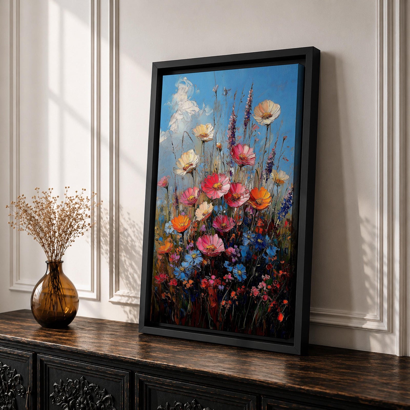 A vibrant impasto painting of a wildflower bouquet featuring pink, orange, cream, and blue flowers against a bright blue sky, rendered with thick textured brushstrokes that emphasize the lively natural floral composition.