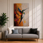 A vibrant impasto style painting of a hummingbird in mid-flight with colorful textured wings and body. The artwork captures the dynamic motion and intricate details of the bird against a warm abstract background, emphasizing wildlife and nature themes in a richly textured animal depiction.