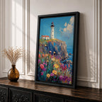 This impasto style painting depicts a lighthouse standing on a rocky cliff overlooking the sea with a vibrant wildflower meadow in the foreground. The thick textured brushstrokes create a rich, colorful coastal landscape scene with blue skies and scattered clouds.