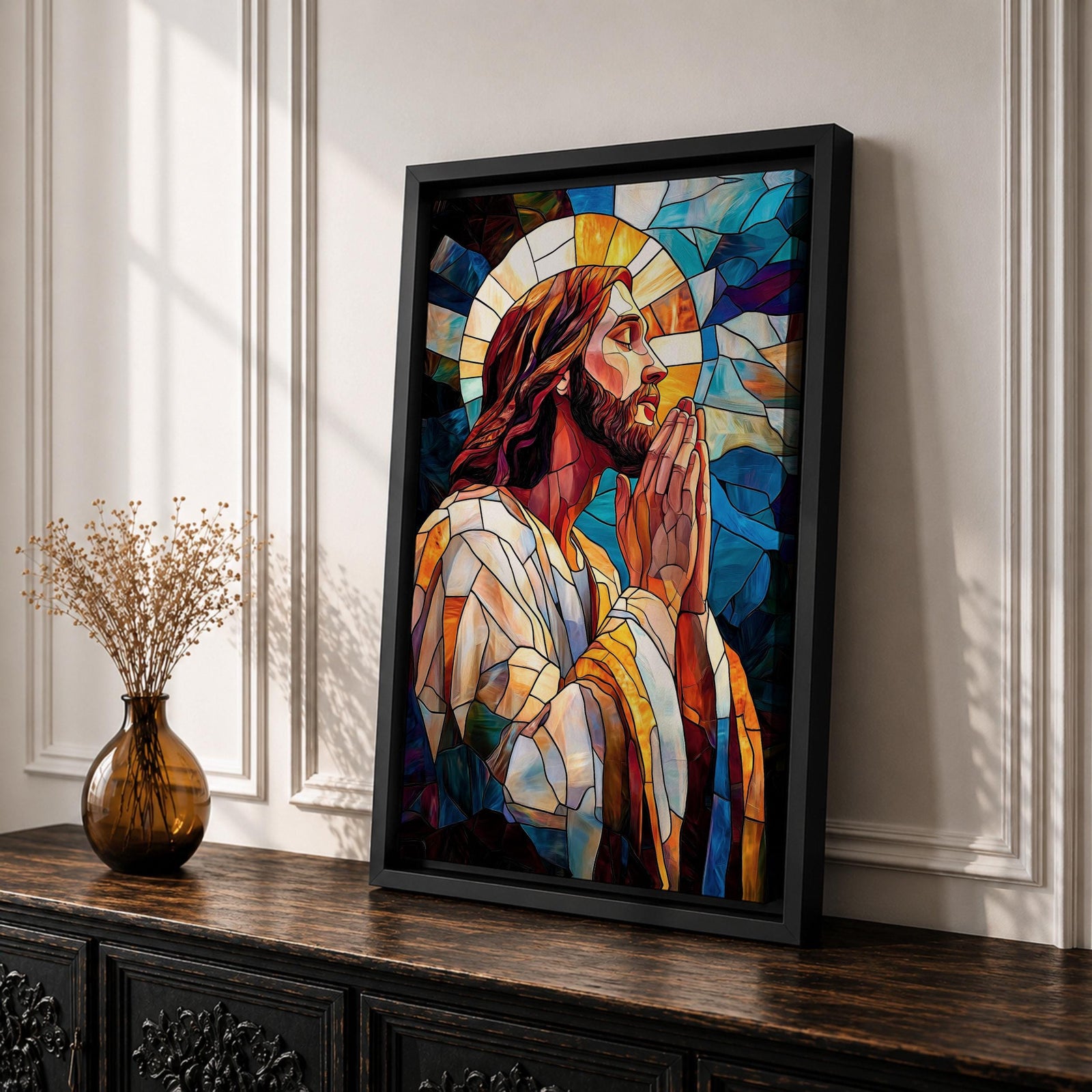 Modern stained glass style illustration of Jesus Christ shown praying with hands clasped and head bowed, portrayed with a calm expression and soft halo, composed of luminous jewel toned glass segments and radiant light patterns, rendered with clean lines and glowing color in a contemporary Christian devotional composition.