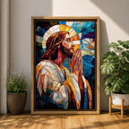 Modern stained glass style illustration of Jesus Christ shown praying with hands clasped and head bowed, portrayed with a calm expression and soft halo, composed of luminous jewel toned glass segments and radiant light patterns, rendered with clean lines and glowing color in a contemporary Christian devotional composition.