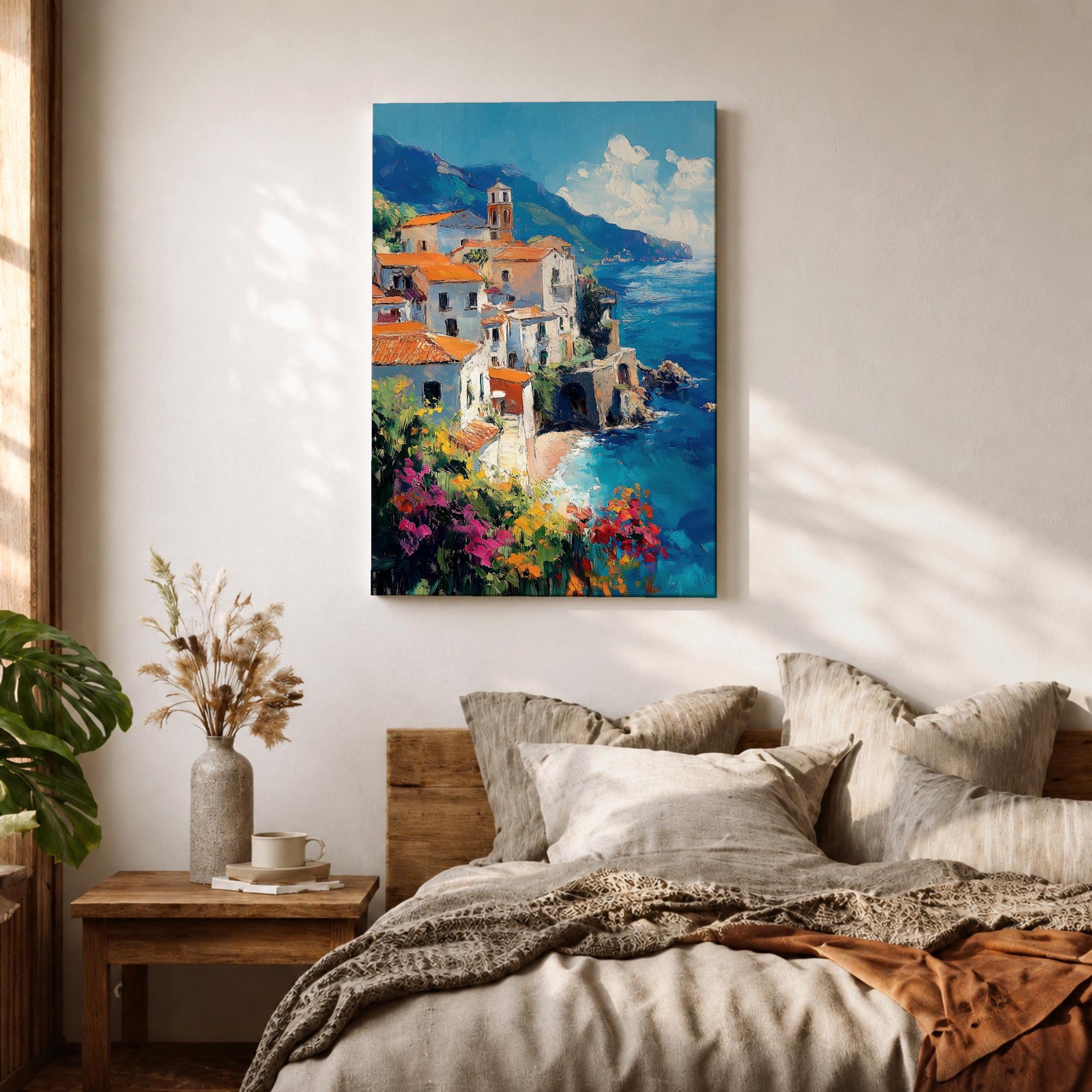 This impasto style framed canvas depicts the Amalfi Coast featuring a cluster of Italian villas with terracotta roofs perched on cliffs overlooking a vibrant blue Mediterranean sea under a partly cloudy sky, with colorful flowers in the foreground enhancing the coastal landscape scene.