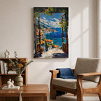 A vibrant framed canvas painting depicting a Mediterranean window opening to a coastal seaside view with terracotta rooftops, boats on deep blue ocean waters, and distant mountains under a bright sky. The artwork captures a scenic landscape with detailed brushstrokes and rich textures.
