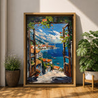 A vibrant framed canvas painting depicting a Mediterranean window opening to a coastal seaside view with terracotta rooftops, boats on deep blue ocean waters, and distant mountains under a bright sky. The artwork captures a scenic landscape with detailed brushstrokes and rich textures.