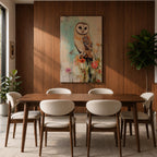 A detailed vintage-style framed canvas art print depicting a barn owl perched on a branch surrounded by wildflowers. The artwork features a rustic, naturalistic approach with soft textures and muted colors, capturing the essence of wildlife and farmhouse charm in a classic animal portrait style.