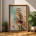 A detailed vintage-style framed canvas art print depicting a barn owl perched on a branch surrounded by wildflowers. The artwork features a rustic, naturalistic approach with soft textures and muted colors, capturing the essence of wildlife and farmhouse charm in a classic animal portrait style.