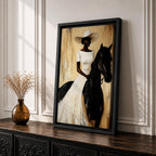 A framed painting of a woman dressed in a white dress and wide-brimmed hat riding a black horse. The artwork features a realistic style with warm beige and brown tones in the background, emphasizing the elegant posture of the rider and the horse’s strong presence.