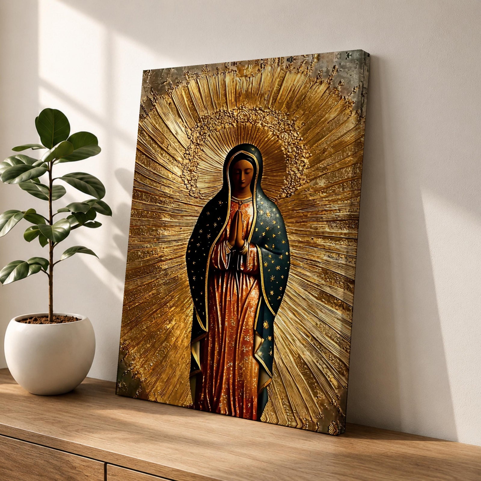 Illustration of Our Lady of Guadalupe also known as La Morenita standing with hands clasped in prayer, wearing a rose colored gown and a teal mantle covered with gold stars, surrounded by radiant golden rays and highlighted with antique gold tones, with a small angel beneath her, rendered in a devotional style inspired by Mexican Catholic iconography.