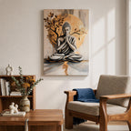 A framed canvas artwork depicting Buddha seated in meditation with hands in prayer position, set against a large golden circular background and stylized tree branches. The image is rendered in a realistic style with soft shading and a serene expression, emphasizing calm and mindfulness.