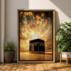 The Kaaba at Masjid Al Haram in Mecca stands beneath a radiant golden sky with sunlight bursting through dramatic clouds, illuminating the sacred black cube and creating a powerful spiritual atmosphere around the holy mosque.