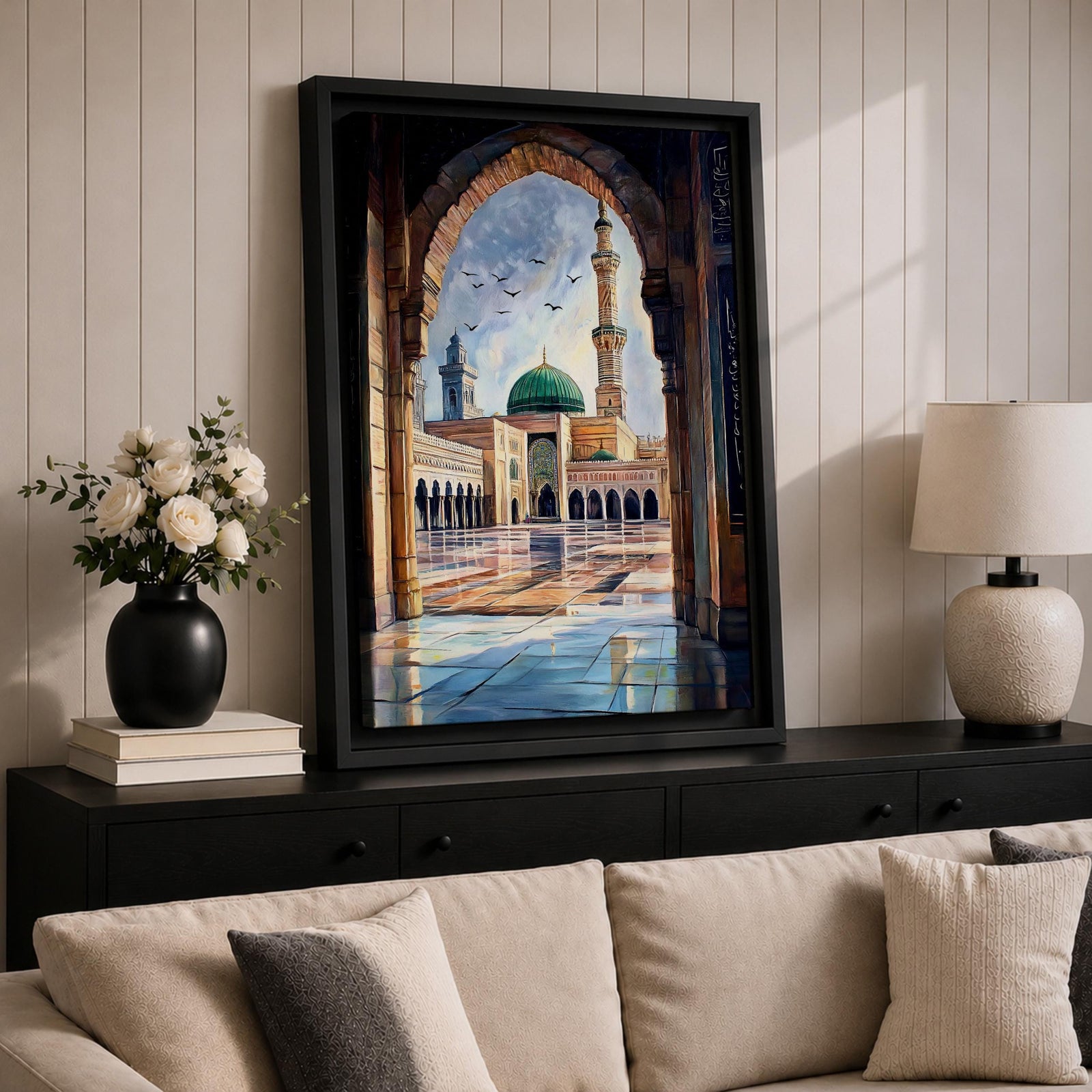 Painting of Masjid Nabawi in Medina seen through a grand stone archway, showing the iconic green dome, tall minaret, and reflective marble courtyard with birds flying above the sacred Prophet’s Mosque and detailed Islamic architectural arches framing the serene mosque complex.
