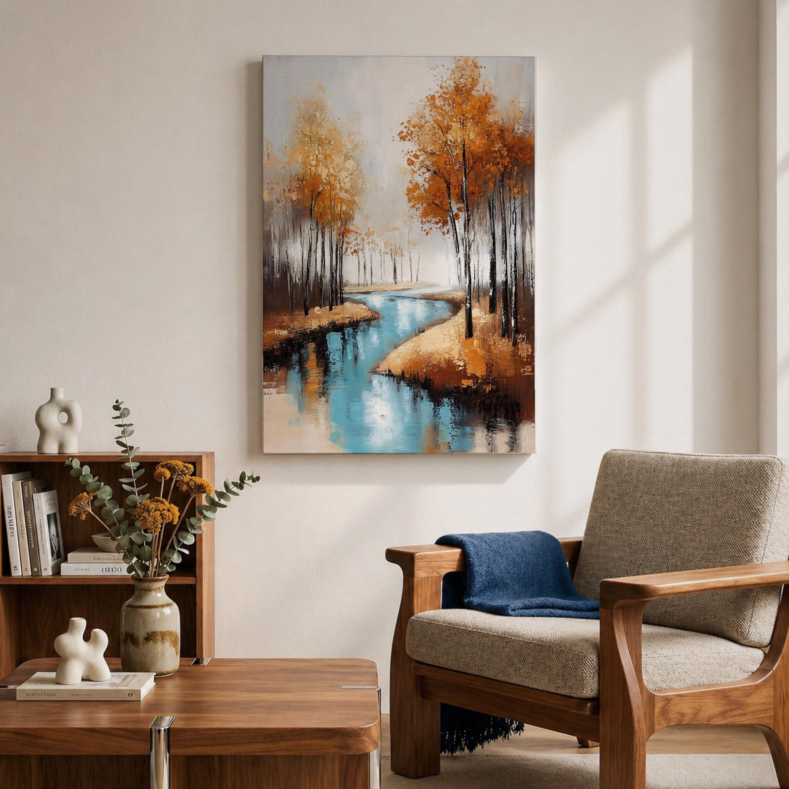 A framed canvas painting depicting an autumn river winding through a forest with tall trees in fall colors. The artwork features a vintage style with textured brushstrokes, emphasizing the natural landscape and serene water reflections in warm rustic tones.