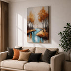 A framed canvas painting depicting an autumn river winding through a forest with tall trees in fall colors. The artwork features a vintage style with textured brushstrokes, emphasizing the natural landscape and serene water reflections in warm rustic tones.