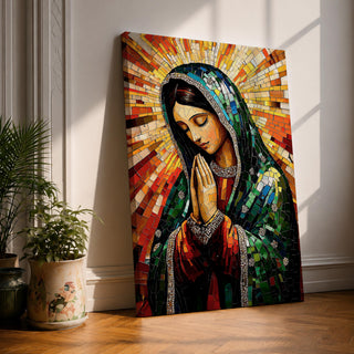 Mosaic style illustration of Our Lady of Guadalupe also known as the Mexican Virgencita standing with hands clasped in prayer, wearing a rose colored gown and a teal mantle covered with gold stars, surrounded by radiant golden rays and composed of small colorful tile patterns with a small angel beneath her in Mexican Catholic devotional style.