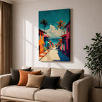 A vibrant painting depicting a tropical beach village with colorful houses lining a descending street toward the ocean. Palm trees rise above the rooftops under a bright blue sky with fluffy clouds. The artwork captures a lively coastal town atmosphere in a bold, illustrative style.